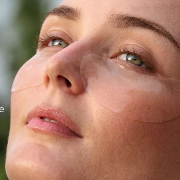Tropic Hydrogel Eye Masks worn on the under-eye area